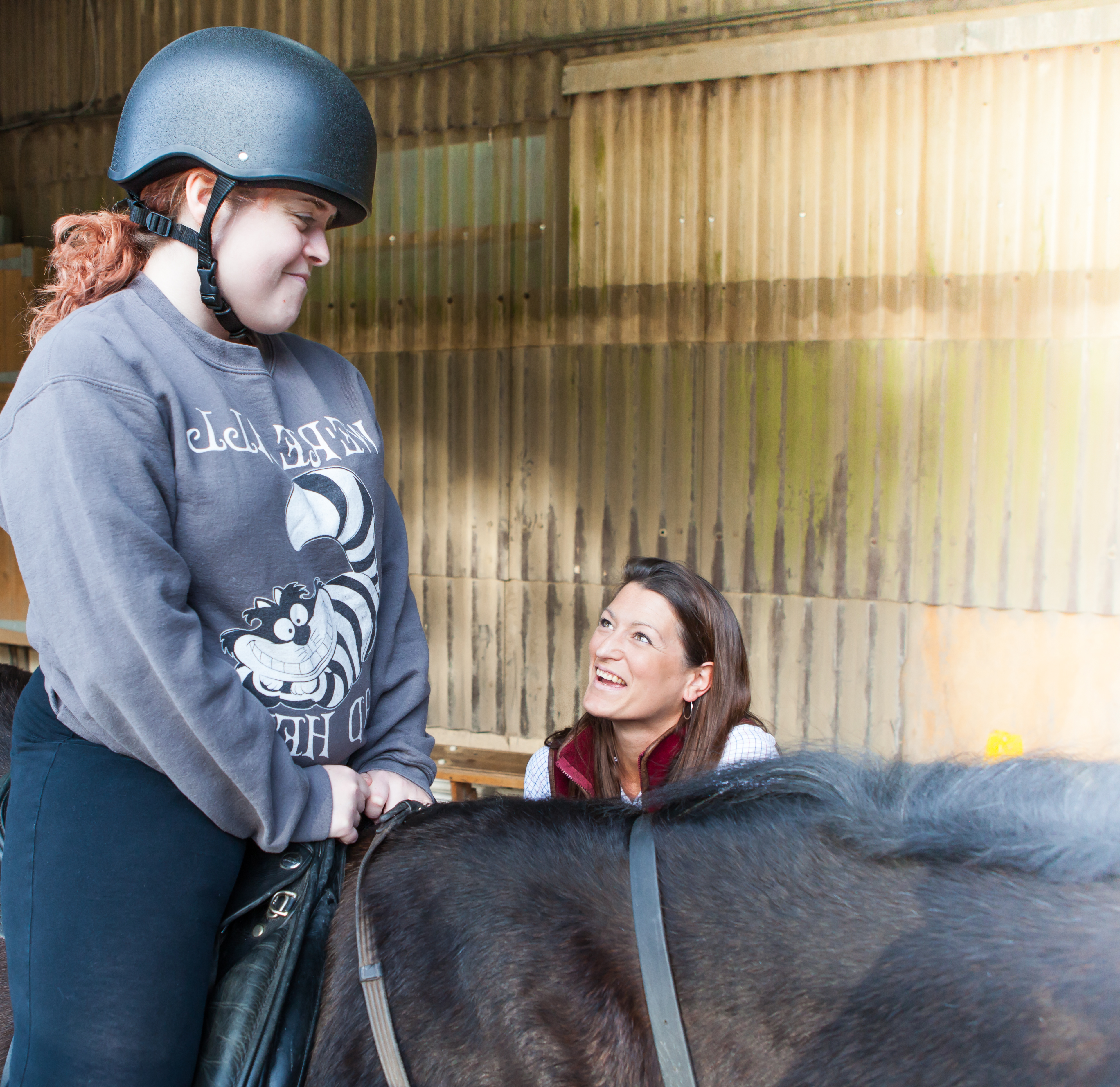 Rebecca, riding a horse
